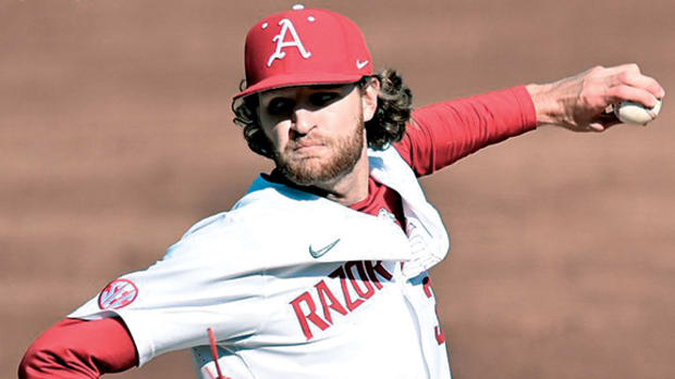 Hunter Hollan pitches in the SEC opener against Auburn at Baum-Walker Stadium.